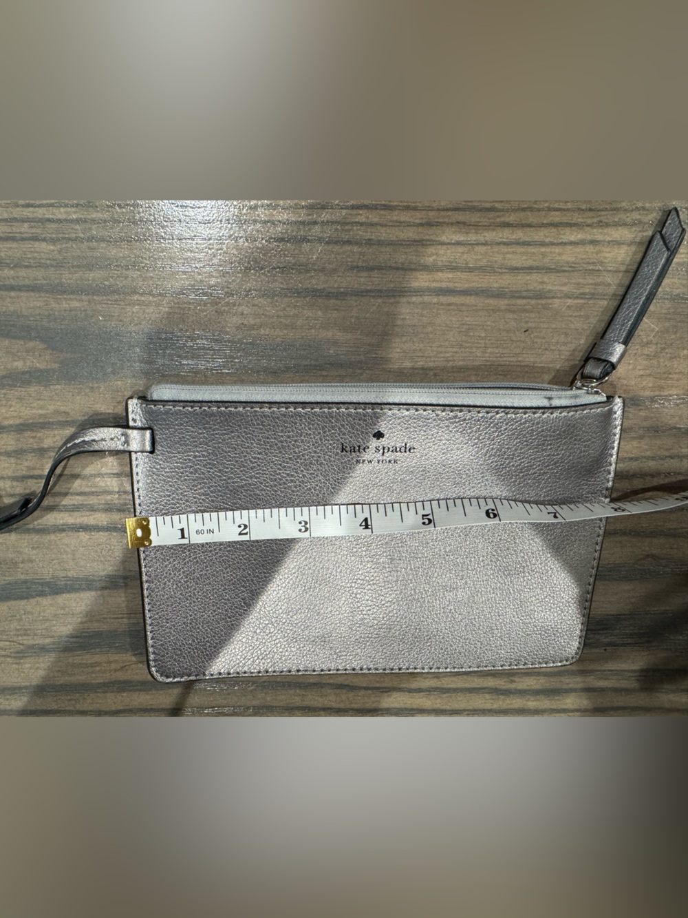 kate spade Silver Metallic Leather Wristlet with Logo